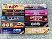 Cigarettes papers, Raw papers & tips, Ocb papers, Rizla’s, blunt Wraps, Grinders, Cones, Baggies, , Lighters, &  Balloons