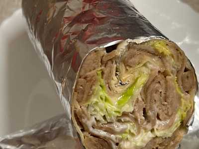 4 Dürüm de Pollo o Carne y 1.25 L de Coca Cola