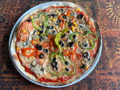 Pizza Vegetal, Mediana