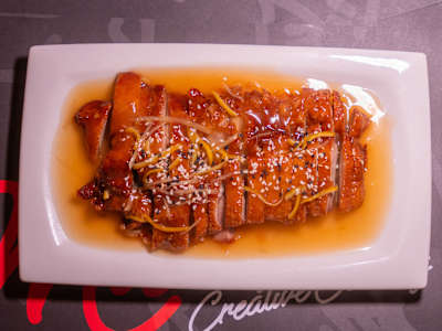Pato Caramelizado con Semillas de Sésamo