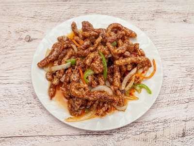 Ternera Crujiente con Salsa de Naranja Caramelizada