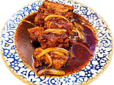 Costilla con Salsa Quindu