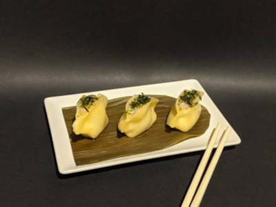 Ravioli de Vieira y Langostinos con Alga Nori y Salsa Ponzu