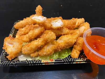 Pescado blanco rebozado con salsa