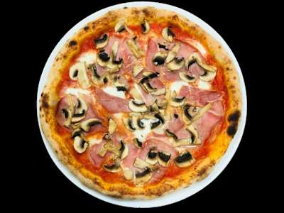 Prosciutto e funghi