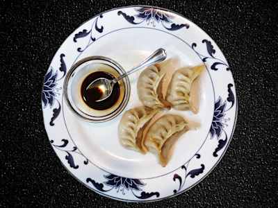 10 -  Ravioloni di Carne Brasati -contiene 1 Salsa di Soia - 4 pezzi