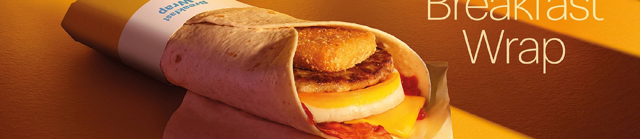 Breakfast Wrap  Breakfast Wrap (written vertically on the wrapper)  Served until 11am. Subject to availability. © 2025 McDonald's