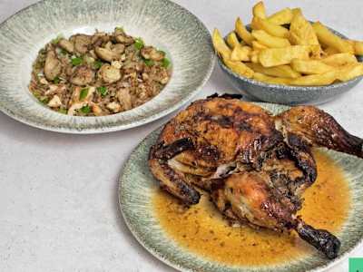 Pollo entero + Porción de patatas + arroz chaufa + inca kola 2.25lt