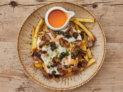 Huevos rotos con Trufa y Boletus