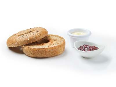 Bagel De Cereales Con Mermelada Y Mantequilla