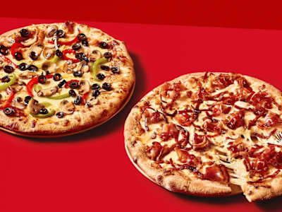 2 Pizzas medianas especialidad