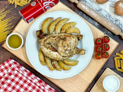 Menù mezzo pollo con patate al forno
