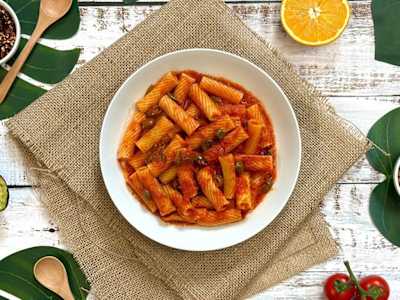 Rigatoni con promodorini, olive e capperi